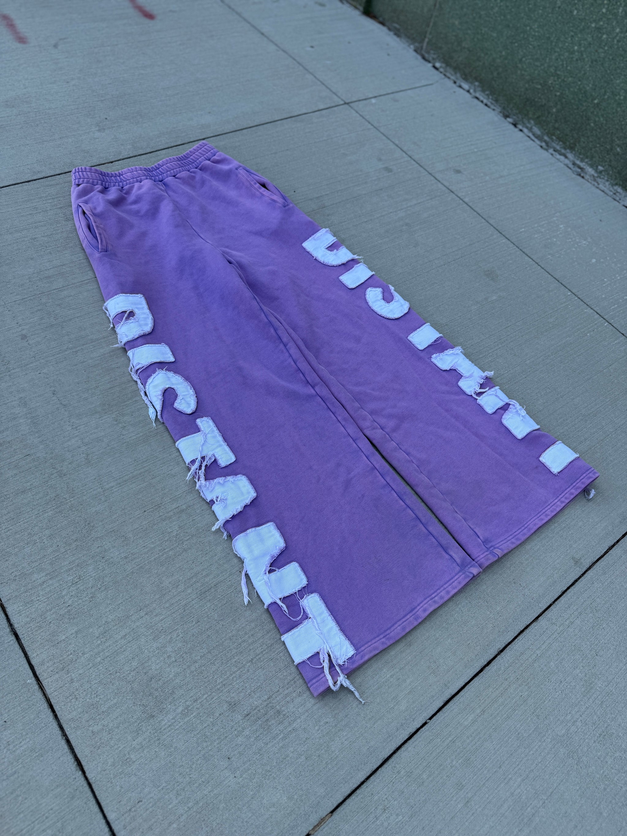 PURPLE TRACKSUIT